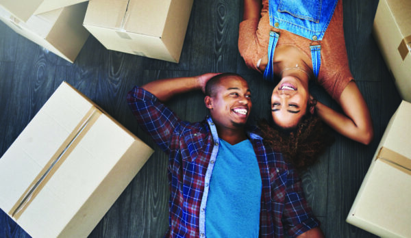 Shot of an attractive young couple moving house